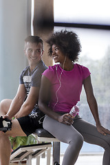 Image showing couple in a gym have break