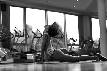 Image showing african american woman exercise yoga in gym