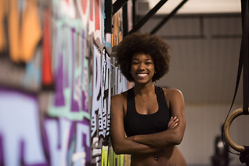 Image showing portrait of black women after workout dipping exercise