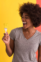 Image showing black woman painting wall