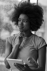 Image showing african american woman using tablet