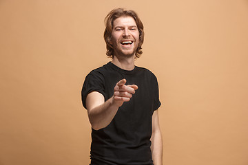 Image showing The happy business man point you and want you, half length closeup portrait on pastel background.