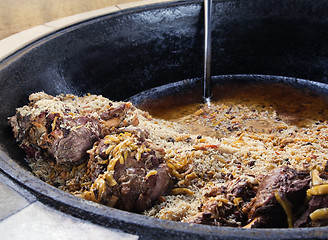 Image showing Pilaf cauldron, close-up