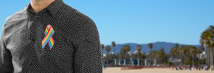 Image showing man with gay pride rainbow awareness ribbon