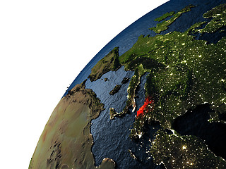 Image showing Albania in red on Earth at night