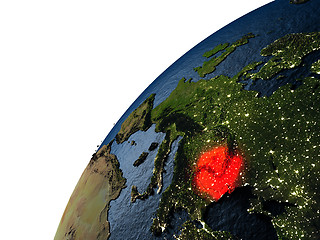 Image showing Romania in red on Earth at night