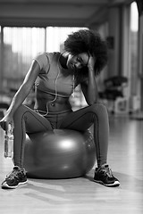 Image showing woman  relaxing after pilates workout