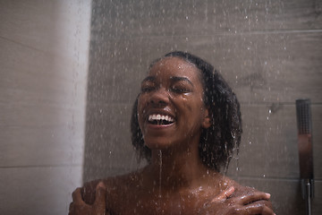 Image showing African American woman in the shower