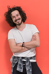 Image showing young man with funny hair over color background