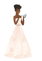 Image showing African-american fiancee holding a mobile phone.