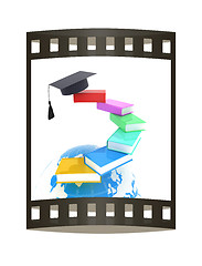 Image showing Earth of education with books around and graduation hat. Global 