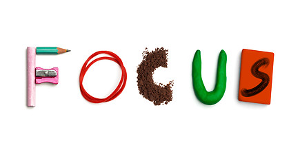 Image showing The word focus created from office stationery.