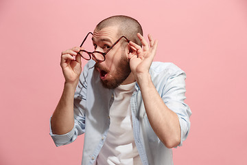 Image showing The happy business man standing and young man listening