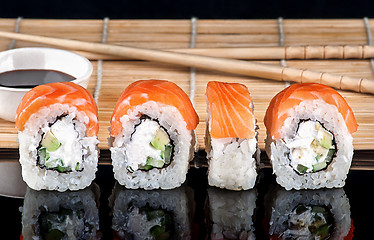 Image showing Philadelphia Sushi roll in a row