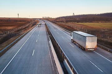 Image showing Highway with cargo trucks