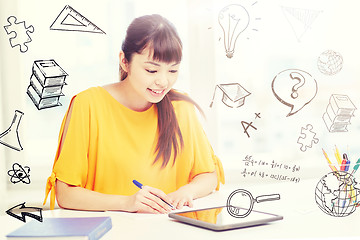 Image showing asian woman student with tablet pc at home