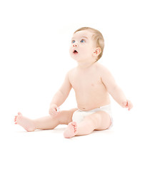 Image showing baby boy in diaper with toothbrush