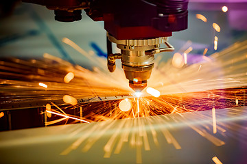 Image showing CNC Laser cutting of metal, modern industrial technology.