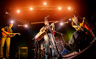 Image showing Band performs on stage in a nightclub