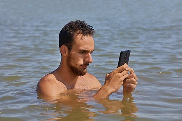 Image showing Smartphone at the beach