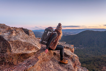 Image showing Female with backpack on mountain peak Blue Mountains