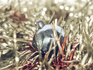 Image showing Vintage looking Christmas bauble and tinsel
