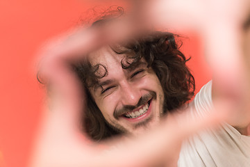 Image showing young man with funny hair over color background