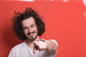 Image showing young man with funny hair over color background