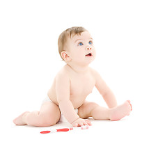 Image showing baby boy in diaper with toothbrush