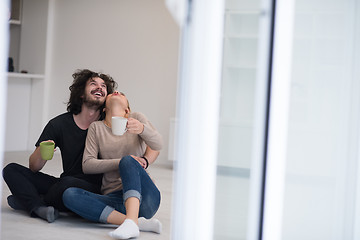 Image showing young couple in their new home