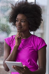 Image showing african american woman using tablet