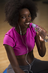 Image showing woman  relaxing after pilates workout