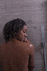 Image showing African American woman in the shower