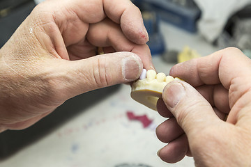 Image showing Dental Technician Working On 3D Printed Mold For Tooth Implants