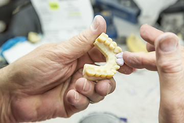 Image showing Dental Technician Working On 3D Printed Mold For Tooth Implants