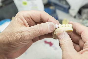 Image showing Dental Technician Working On 3D Printed Mold For Tooth Implants