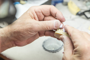 Image showing Dental Technician Working On 3D Printed Mold For Tooth Implants