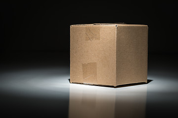 Image showing Blank Carboard Shipping Box Under Spot Light.