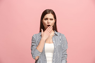 Image showing Beautiful bored woman bored isolated on pink background