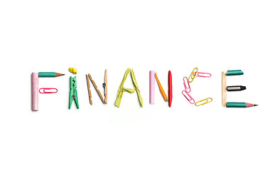 Image showing The word finance created from office stationery.