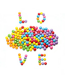 Image showing Word ''Love'' and bright colorful candy