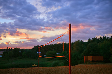 Image showing Playground With Beach Volleyball Net Under The Sunset Sky