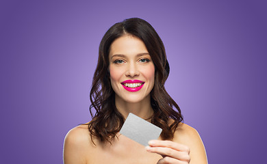 Image showing beautiful woman with pink lipstick and credit card