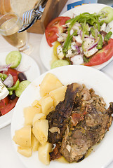 Image showing lamb in the paper greek island taverna food