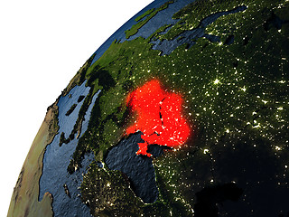 Image showing Ukraine in red on Earth at night