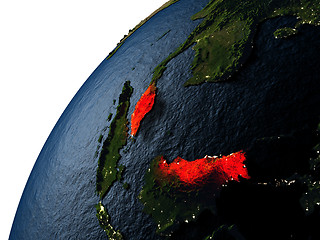 Image showing Malaysia in red on Earth at night