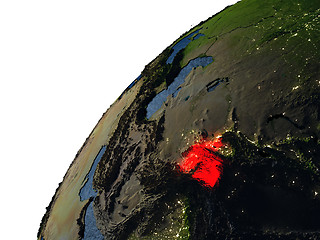 Image showing Tajikistan in red on Earth at night