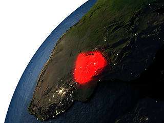 Image showing Zimbabwe in red on Earth at night