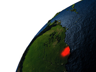 Image showing French Guiana in red on Earth at night