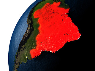 Image showing Brazil in red on Earth at night